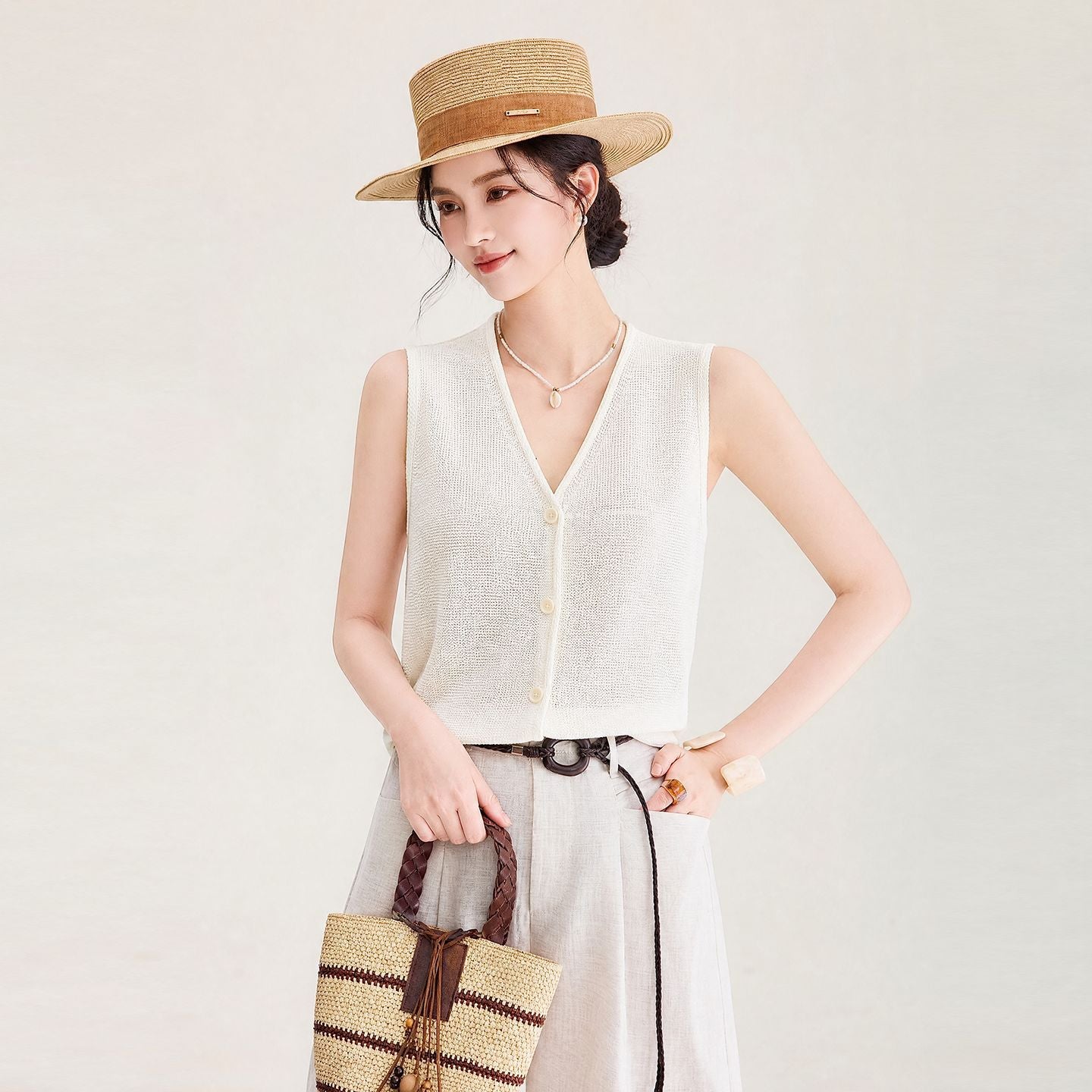 Women's Early Autumn New Hollow Knitted Vest High-end Feel 64% Natural Mulberry Silk V-neck Sleeveless Knitted Cardigan